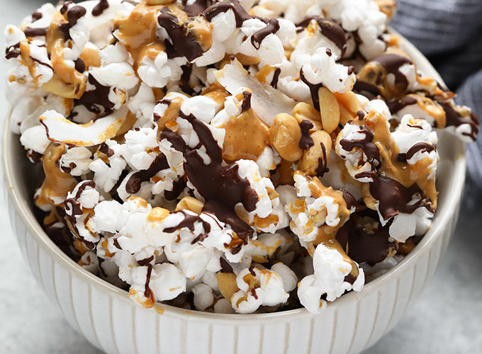 Recipe Image: fit-foodie-finds-dark-chocolate-peanut-butter-popcorn-snack-mix